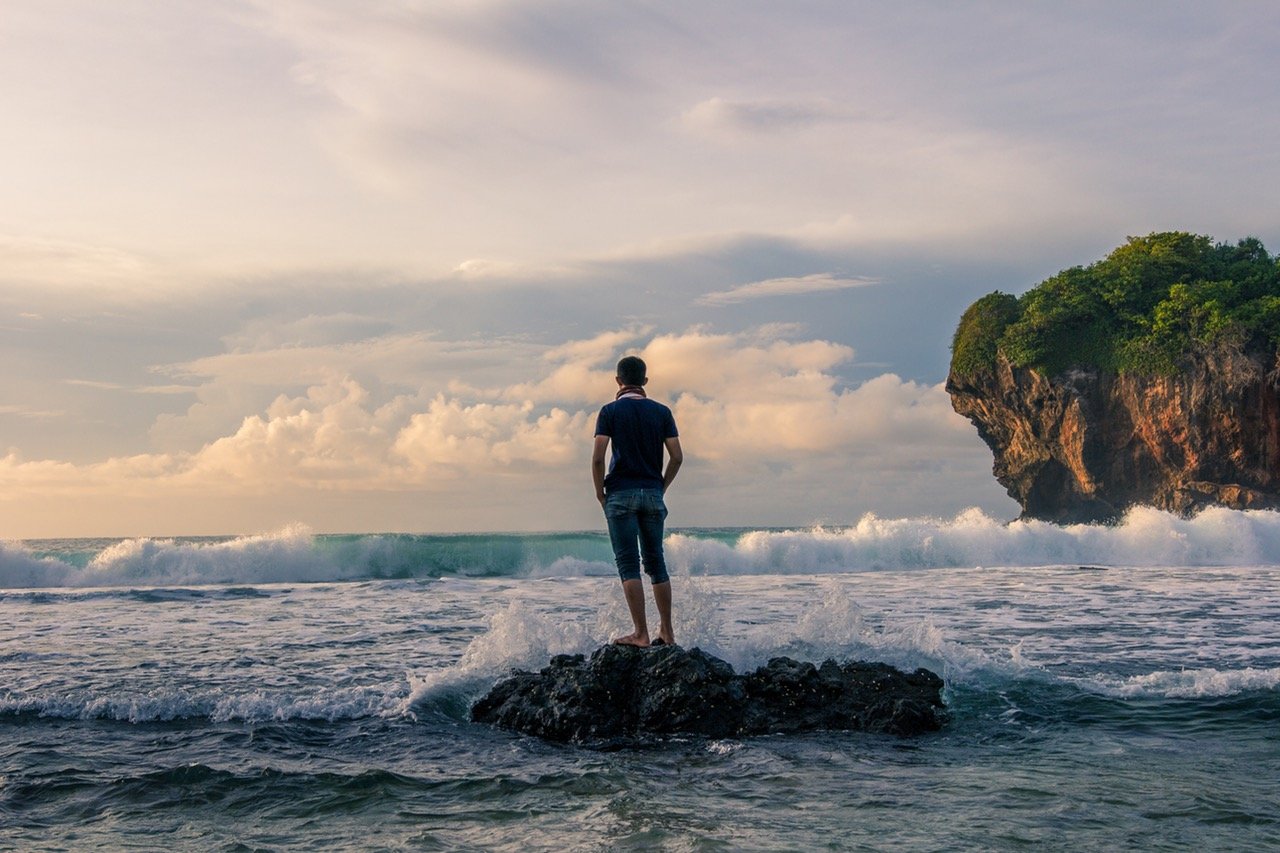 Person standing in water representing determination