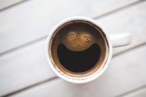 A cup of coffee on a white table